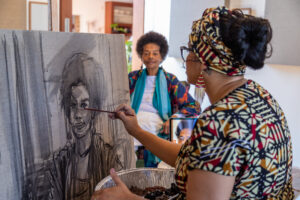 Panmela Castro pinta um retrato